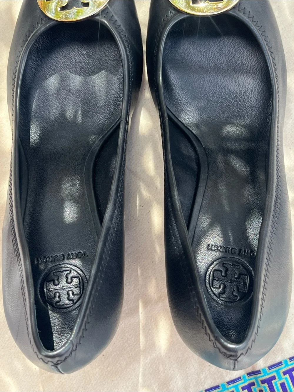 Tory Burch Sally Black Leather Wedge Pumps with Gold Medallion